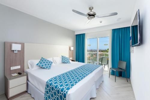 Postel nebo postele na pokoji v ubytování Hotel Riu Papayas - All Inclusive
