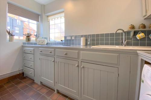 A kitchen or kitchenette at Delf Stream, close to town with lovely sunny terrace