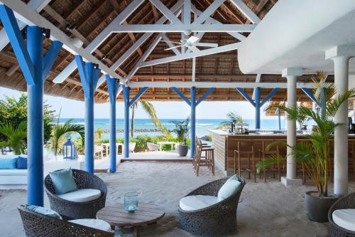 a resort with a view of the ocean at Veranda Pointe Aux Biches Hotel & Spa in Trou aux Biches