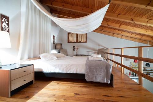 Postel nebo postele na pokoji v ubytování Psamathi Living & Taste