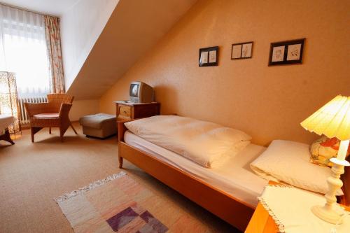 Postel nebo postele na pokoji v ubytování Gästehaus Merk Merk Gbr
