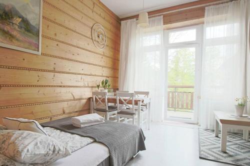 Posteľ alebo postele v izbe v ubytovaní Apartament BazaTatry Stokrotka