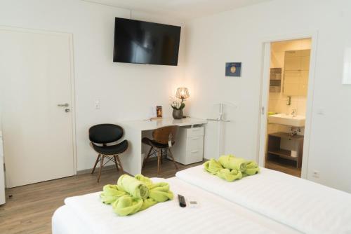 Postel nebo postele na pokoji v ubytování CityApartment K1 KLIMATISIERT