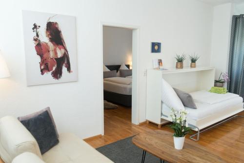 En eller flere senge i et værelse på City Wohnung K2 KLIMATISIERT