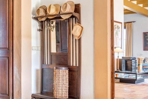 a mirror on a wall next to a room at Son Galiana in Algaida