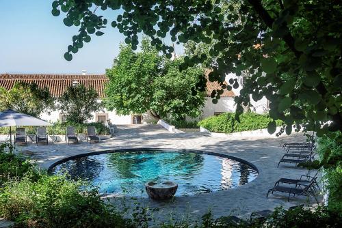 The swimming pool at or close to Convento Sao Paulo - Hotel Rural