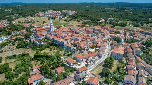 an aerial view of a town with red roofs at Villa Romana in Vrsar