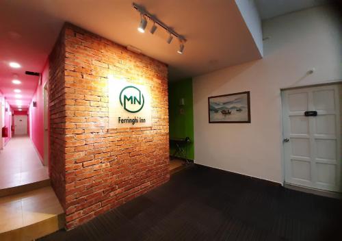 MN Ferringhi Innに飾ってある許可証、賞状、看板またはその他の書類