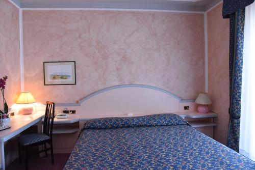 Hotel Grazia Deleddaにあるベッド