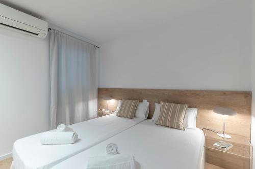 Кровать или кровати в номере Happy Apartments