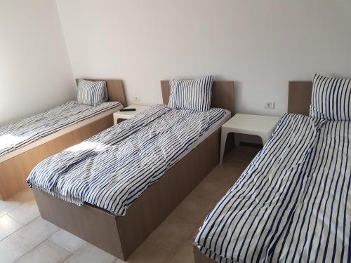 Postel nebo postele na pokoji v ubytování Casa Philos