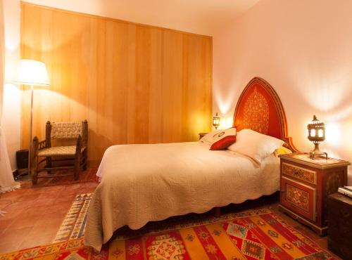 Postel nebo postele na pokoji v ubytování Riad Al Zahia