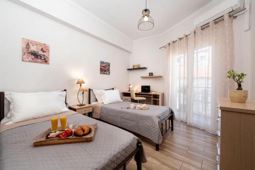 Postel nebo postele na pokoji v ubytování Casa Al Centro Di Corfu