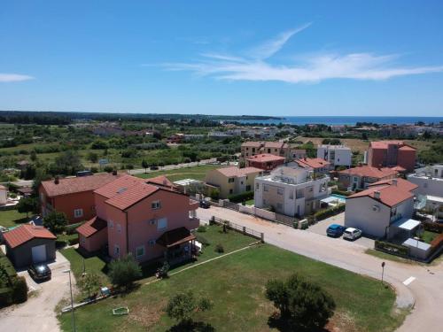 an aerial view of a residential neighbourhood with houses at Guest House Gloria in Novigrad Istria