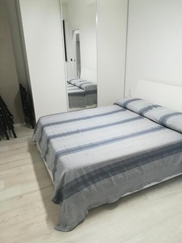 Postel nebo postele na pokoji v ubytování 6 stelle e relax...nientaltro