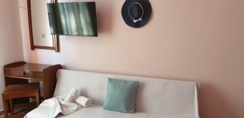 Ένα ή περισσότερα κρεβάτια σε δωμάτιο στο Ilios Apartments