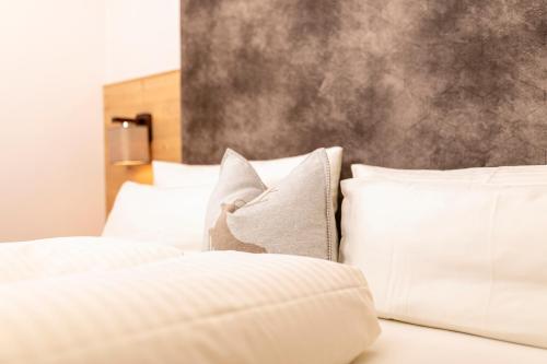 Ein Bett oder Betten in einem Zimmer der Unterkunft Apart Heim