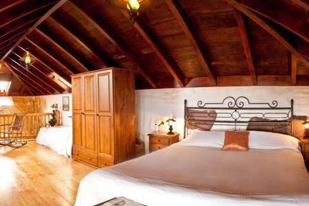 Letto o letti in una camera di Villa Rural Faldas del Teide