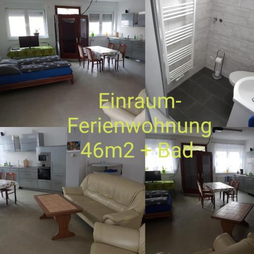een woonkamer met een bank en een tafel bij Einraum-Ferienwohnung 46m2 Eisenhüttenstadt-Diehlo in Eisenhüttenstadt