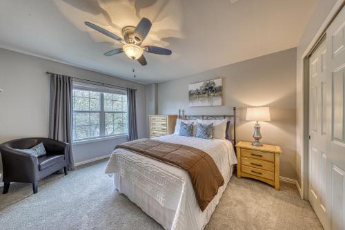 a bedroom with a bed and a ceiling fan at Living the Dream in San Antonio