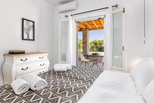 A bed or beds in a room at Daphne's Lux Villa
