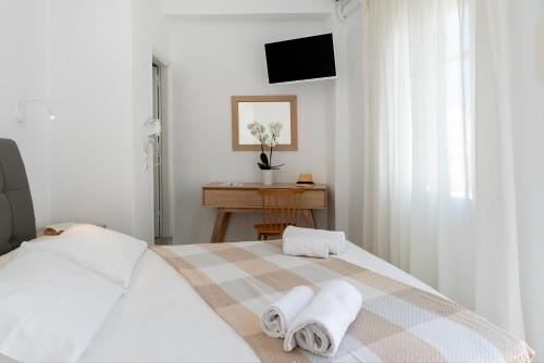 Ένα ή περισσότερα κρεβάτια σε δωμάτιο στο Galinos Hotel for adults only