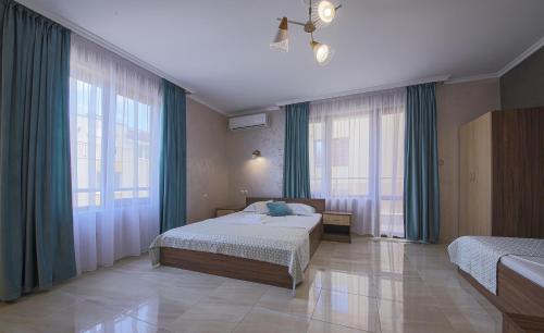 Llit o llits en una habitació de Guesthouse Phoenix