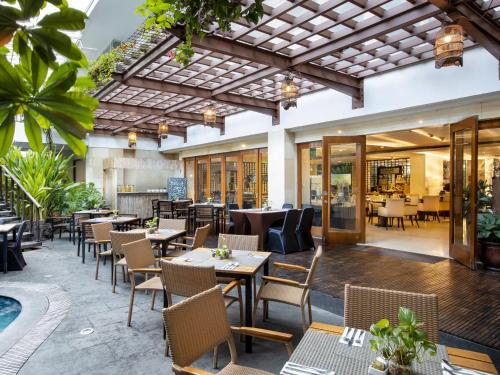 Restaurant o un lloc per menjar a Jambuluwuk Malioboro Hotel Yogyakarta