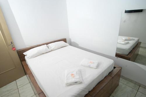 Krevet ili kreveti u jedinici u okviru objekta Hotel Lumem Taguatinga Norte