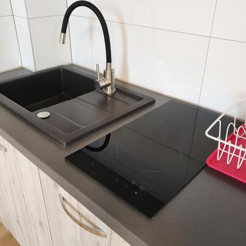 Η κουζίνα ή μικρή κουζίνα στο Apartments Oberschlesien