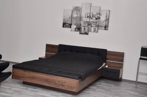 Postel nebo postele na pokoji v ubytování Apartamenty Jacuzzi, klima, wifi,