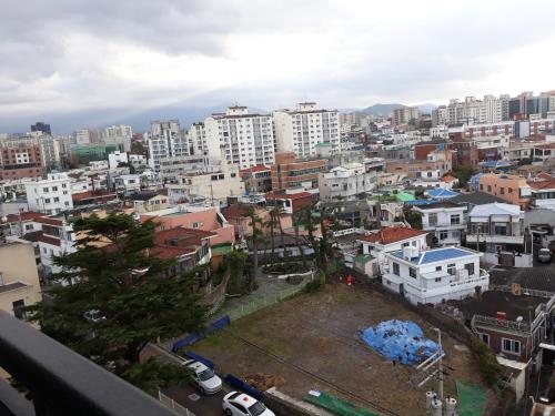 a view of a city with tall buildings at ARA Palace Hotel in Jeju