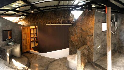 a bathroom with a shower and a sink in a room at Moondance Magic View Bungalow in Koh Tao