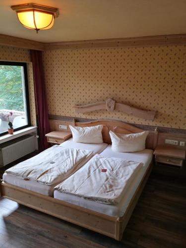 Postel nebo postele na pokoji v ubytování Waldgasthaus am Schwarzenbruch