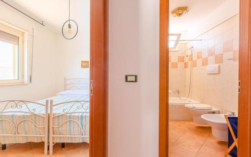 Vonios kambarys apgyvendinimo įstaigoje Villa Orchidea