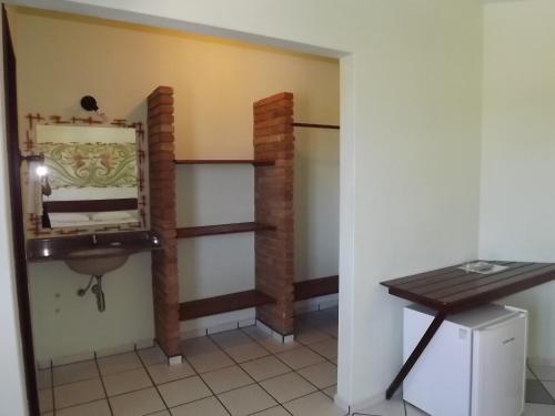 Kuchyň nebo kuchyňský kout v ubytování Pousada Coral de Fogo