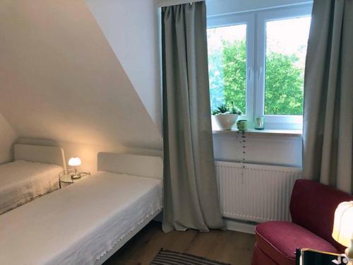 Un pat sau paturi într-o cameră la Ferienwohnung Bartel