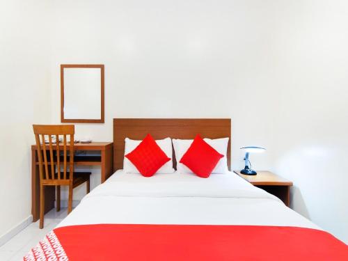 Postel nebo postele na pokoji v ubytování Lawten Hotel