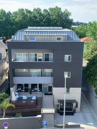 an aerial view of a building with a balcony at Villa Prime Hotel in Vila Nova de Famalicão