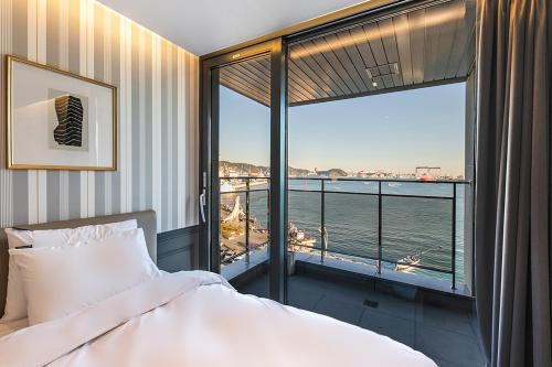 Postel nebo postele na pokoji v ubytování Brown Dot Hotel Ulsan Jangsaengpo