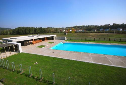 an overhead view of a swimming pool in a yard at Banja Kulaši in Kulaši