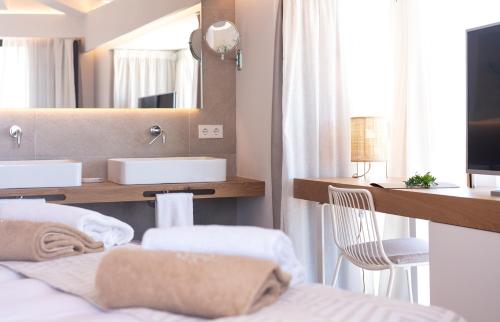 Postel nebo postele na pokoji v ubytování Ynaira hotel & Spa