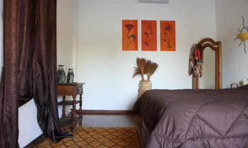 Postel nebo postele na pokoji v ubytování Monte Macário Alojamento Local