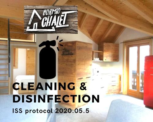 a sign for a cleaning and disinfection in a house at Pista Stelvio Loft Lumière in Bormio
