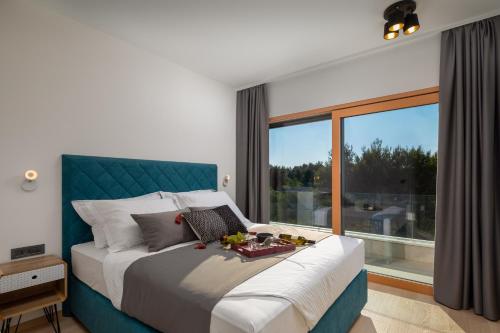 Giường trong phòng chung tại VILLA VM
