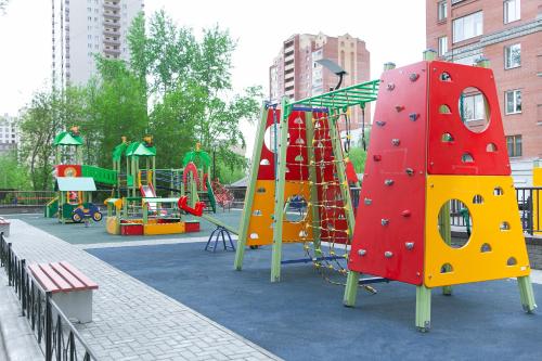 a park with a playground with a play equipment at Central Apartment near by Marriott hotel in Novosibirsk