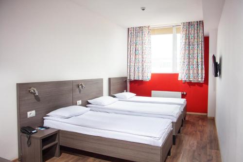 Cama o camas de una habitación en Hotel Marenero