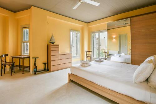 Postel nebo postele na pokoji v ubytování VILLA OTZIAS