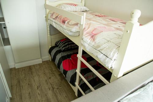 Ένα ή περισσότερα κρεβάτια σε δωμάτιο στο Bed & Beach Sydney