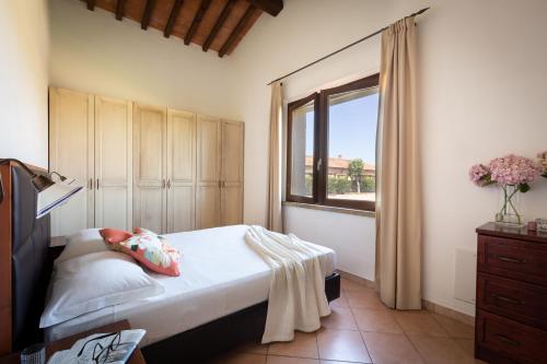 Postel nebo postele na pokoji v ubytování Borgo Verde